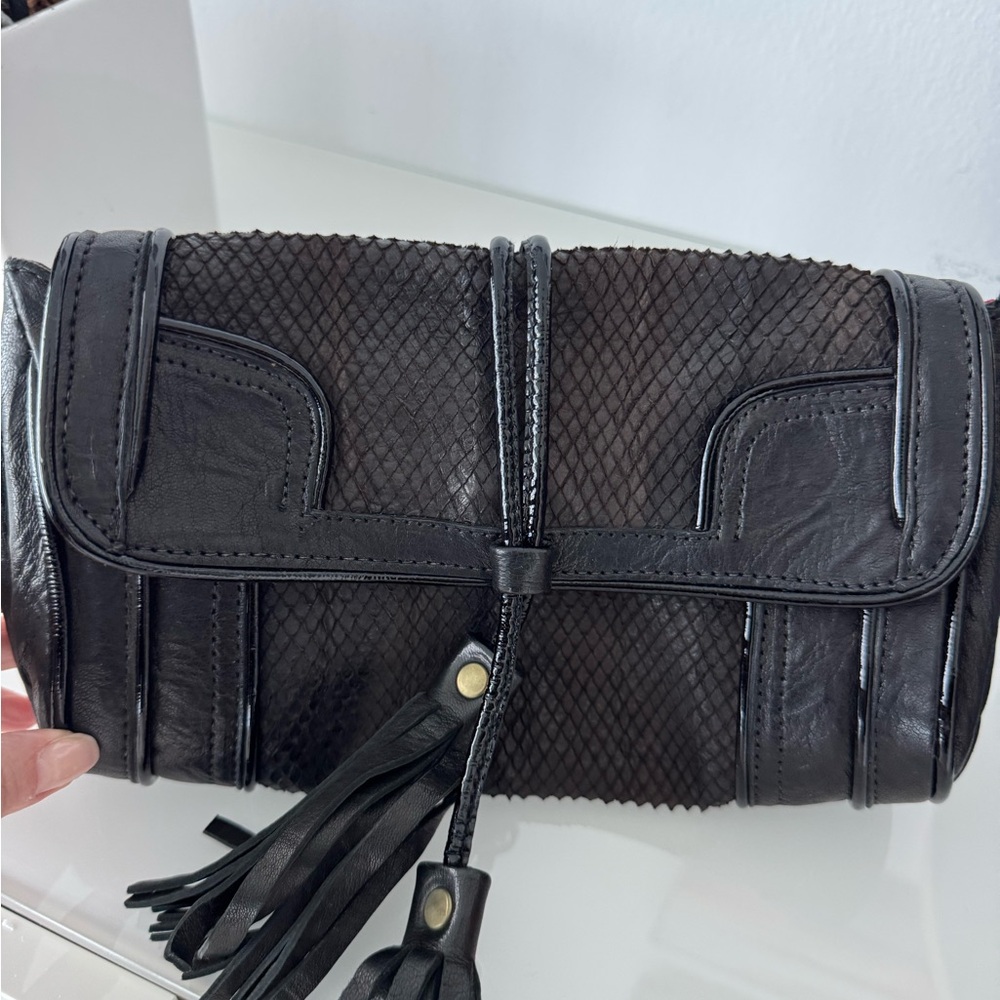 Elegant Black Leather Clutch with Tassel Detail with Snakeskin